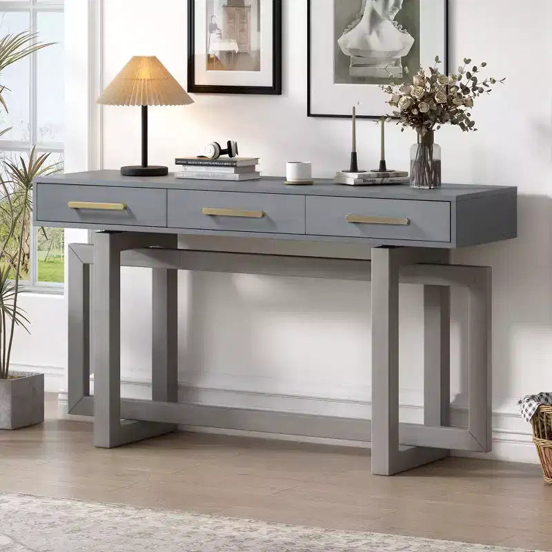 Consolle elegante con tre cassetti